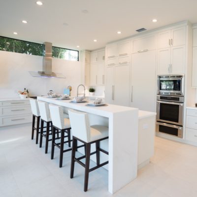 White kitchen of contemporary home in Rio Vista, Fort Lauderdale