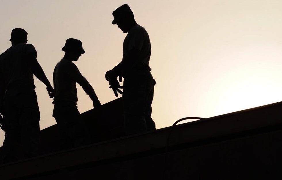 Two Men Working on a Construction Project